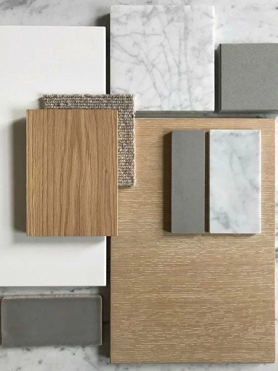 Kitchen countertop material samples, including wood, marble, and stone, showcasing different textures.