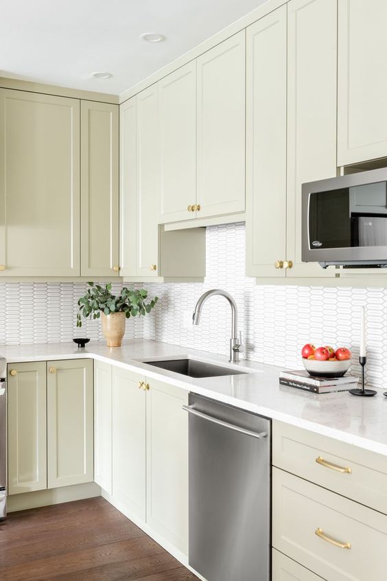 traditional green painted kitchen with a modren touch