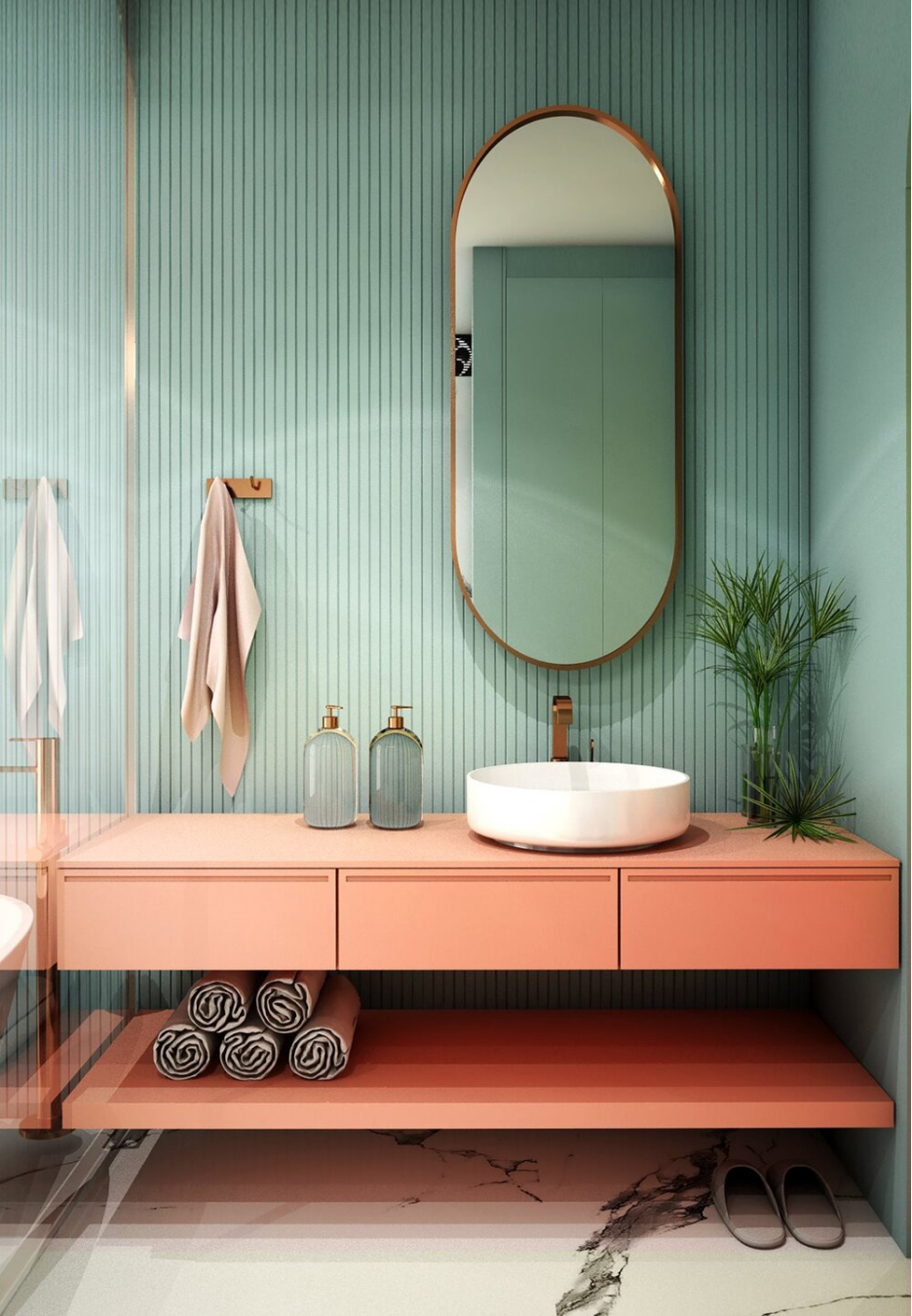 Soft muted tones in green and blush are cekebrated in this simple bathroom.
