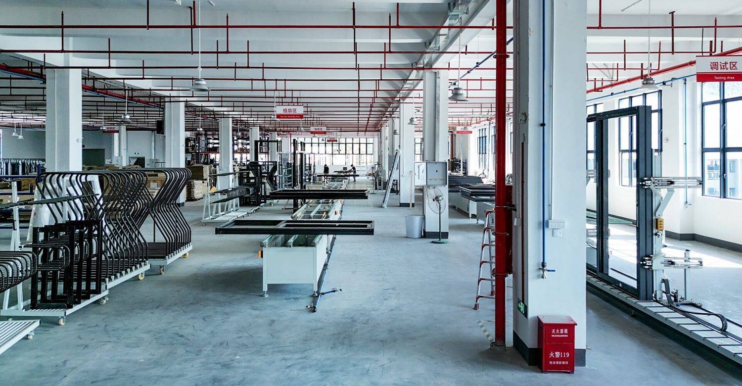 Modern manufacturing facility for custom windows with advanced equipment and spacious layout.