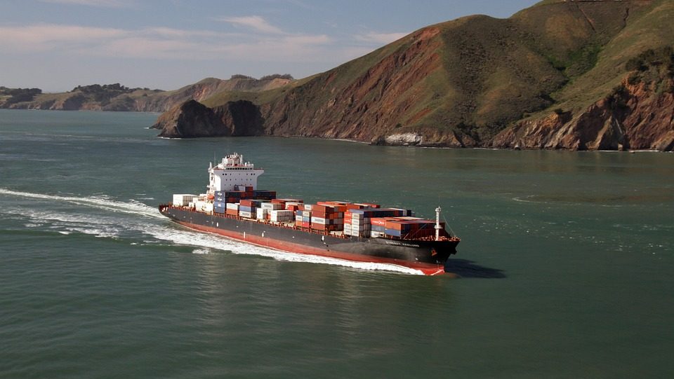 A cargo ship transporting containers across the ocean for global delivery.