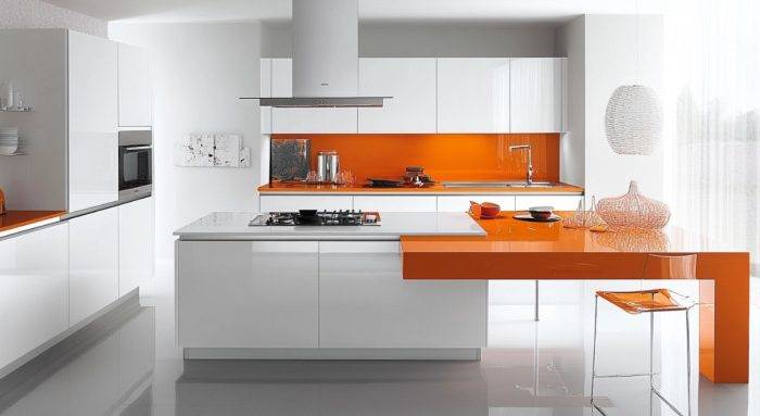 modern white kitchen cabinets with orange countertop