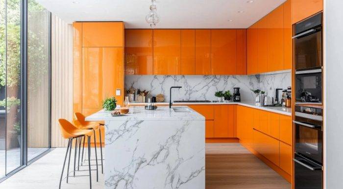 sleek orange kitchen cupboards