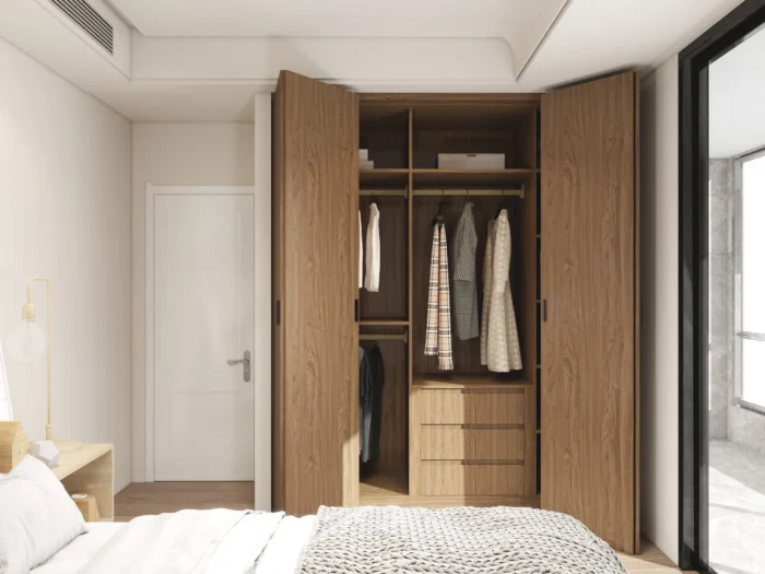 Wardrobe designs for small bedroom featuring foldable doors for space efficiency
