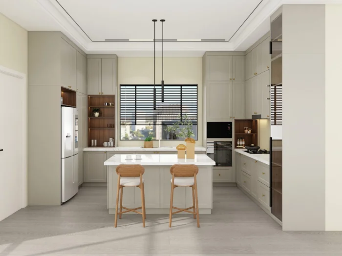 25 ideas inspiradoras de gabinetes de cocina en tonos greige para realzar tu hogar 2 Gabinetes de cocina color grisáceo con herrajes de latón, encimeras blancas y detalles de madera en una cocina clásica moderna.