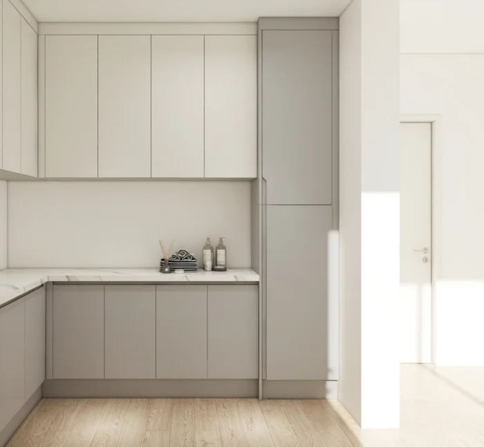 25 ideas inspiradoras de gabinetes de cocina en tonos greige para realzar tu hogar 25 Cocina compacta con gabinetes de cocina en color grisáceo, encimeras blancas y luz natural para un diseño luminoso y que ahorra espacio.