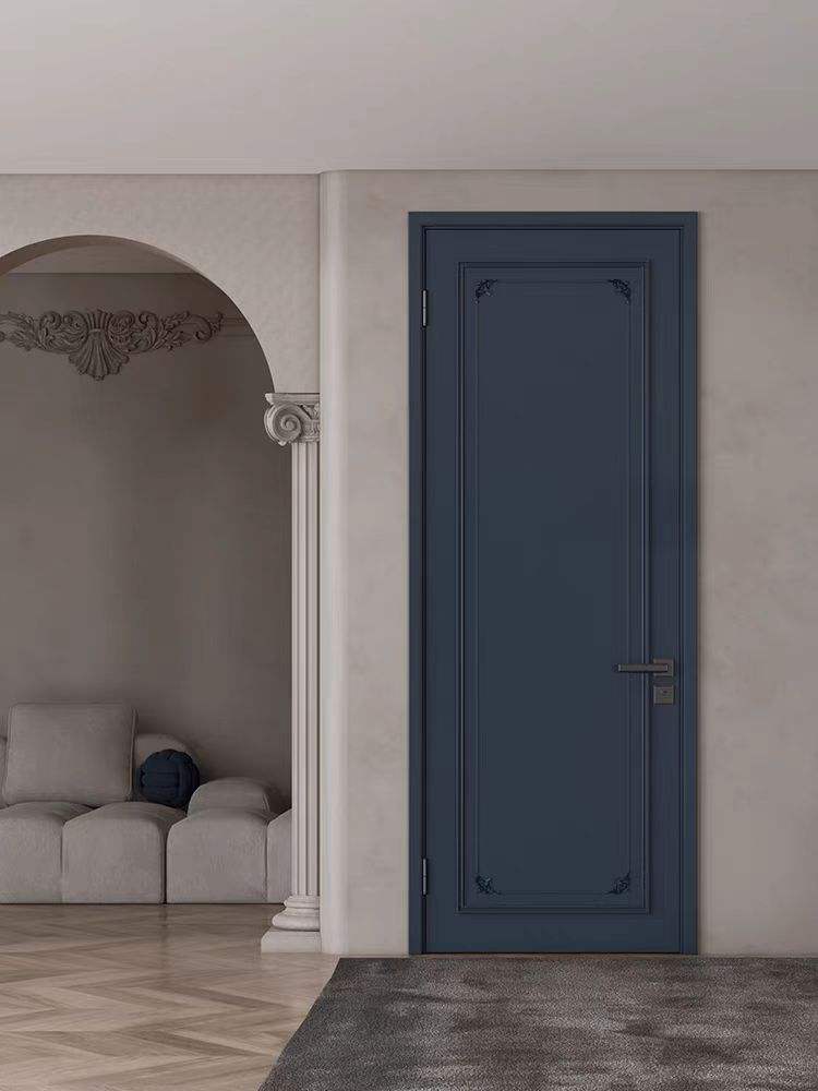 Navy blue painted ecological door with intricate detailing, set in a classical modern interior with decorative molding.