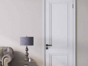 White-painted ecological door with a classic panel design, complementing a modern interior with elegant decor.