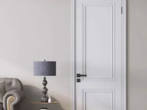 White-painted ecological door with a classic panel design, complementing a modern interior with elegant decor.