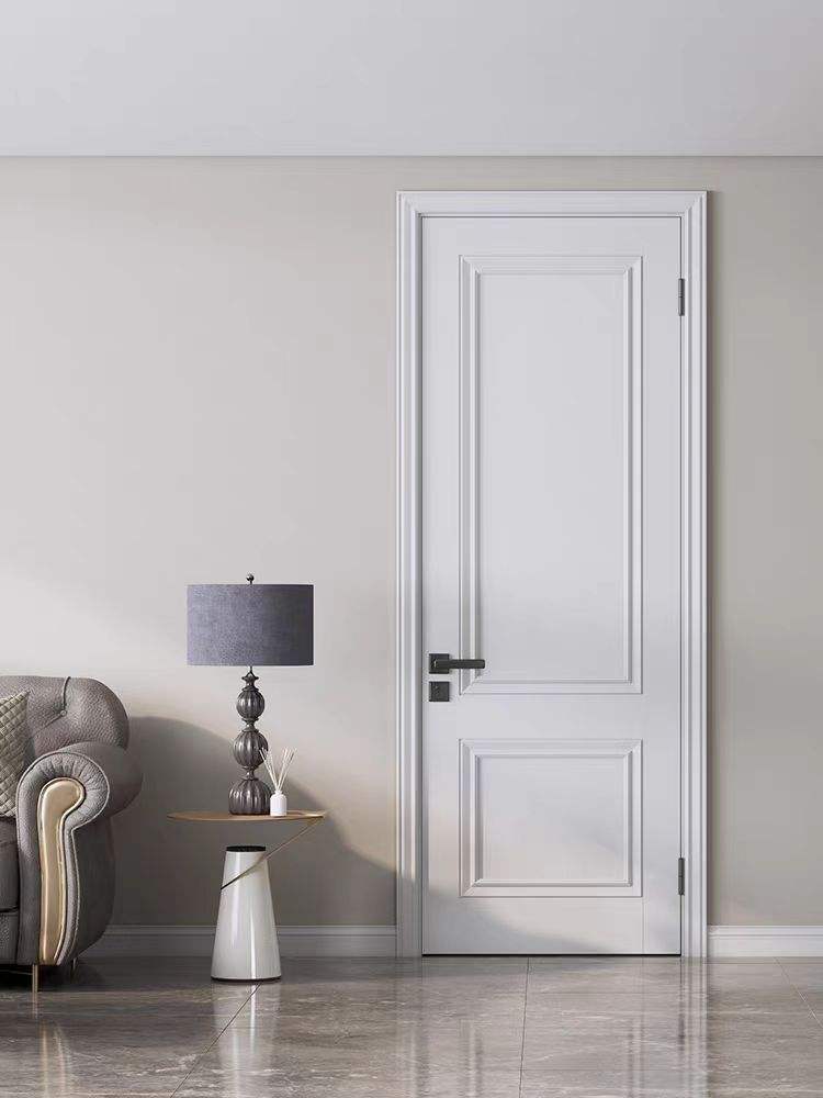 White-painted ecological door with a classic panel design, complementing a modern interior with elegant decor.