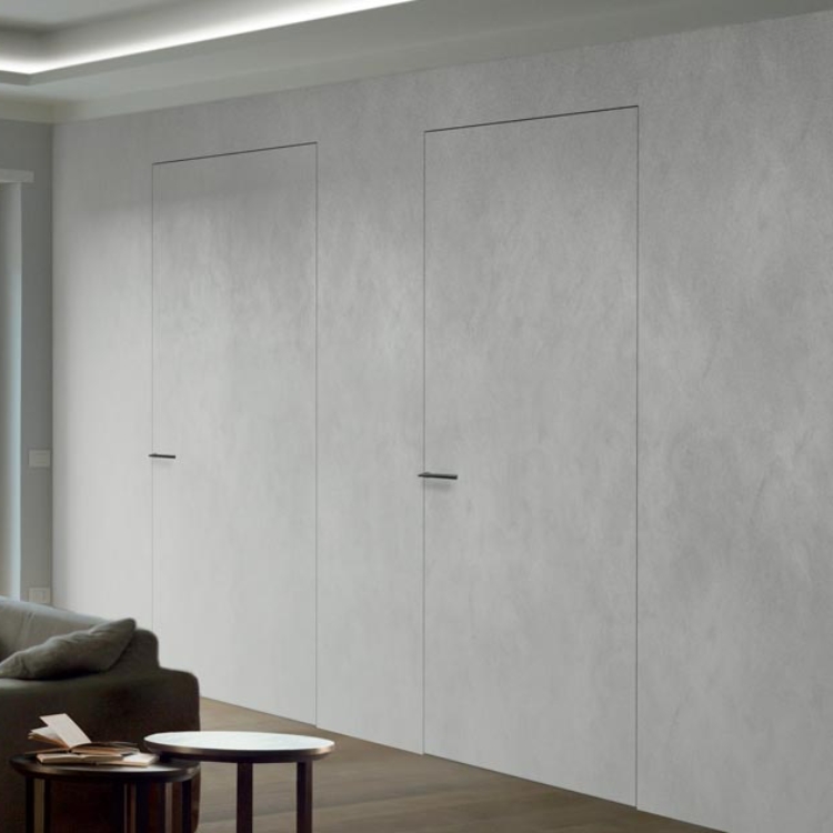 Seamless modern gray minimalist interior doors with a flush design, blending into a textured gray wall for a sleek and contemporary aesthetic.