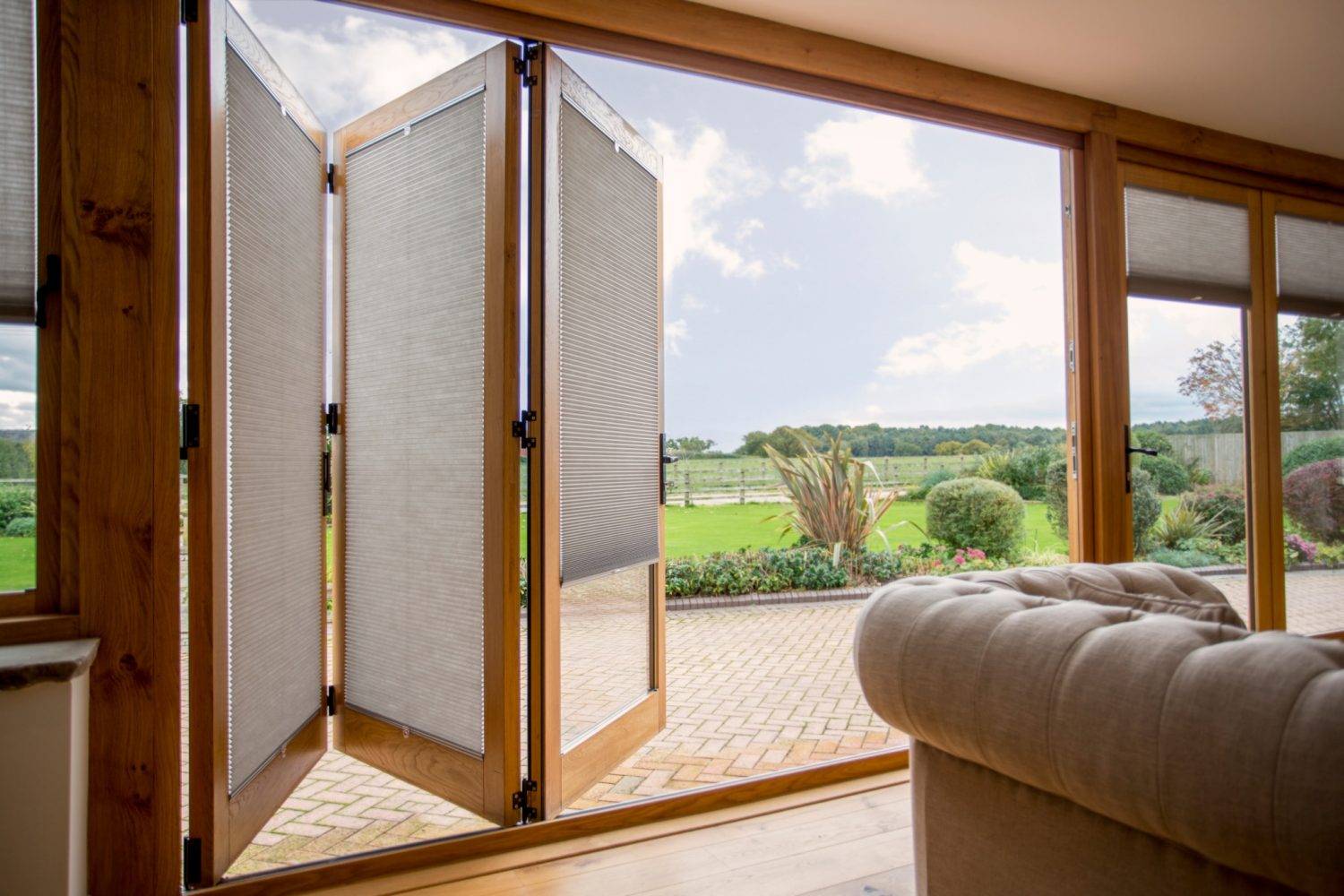 Wooden-Bi-fold-Doors with blinds