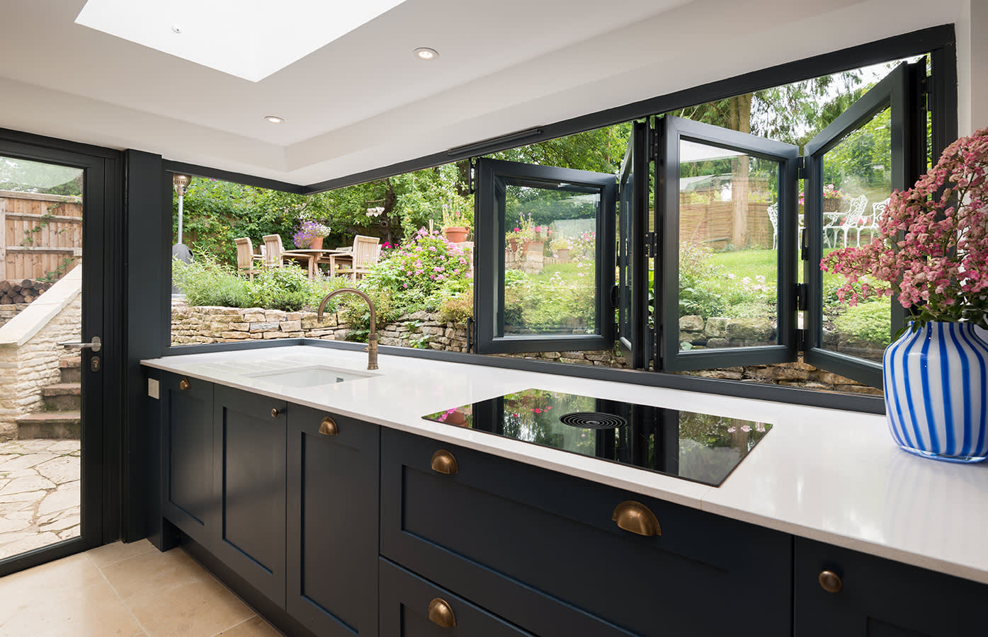 contemporary black-aluminum-fold-window-designs