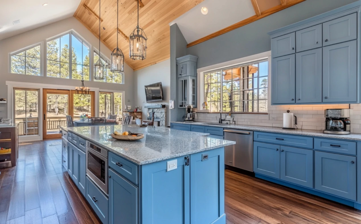 Latest blue kitchen cabinets design ideas 3 Luxurious kitchen with purple cabinets and white marble countertops, combining bold and refined aesthetics.