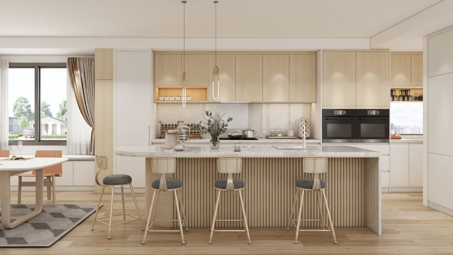 Fluted wood-paneled kitchen island with white marble countertop, gold-accent stools, light wood cabinets and built-in dining nook