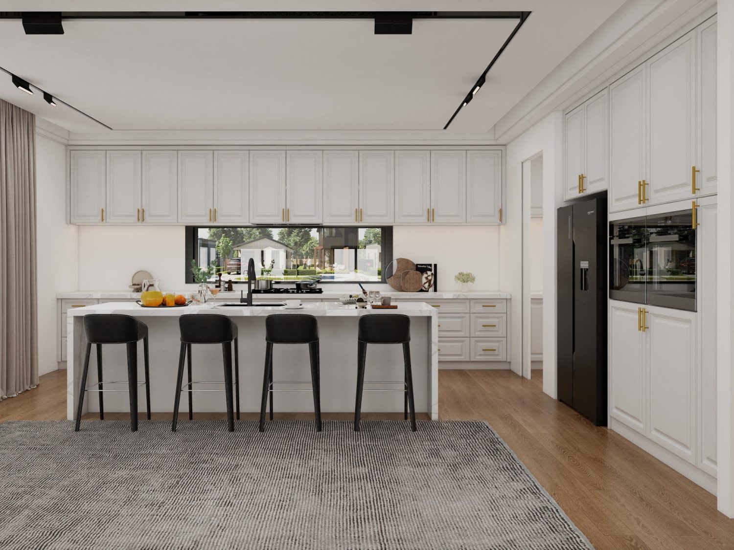 White Shaker kitchen units with brass handles, framed-panel doors, marble island and oak flooring