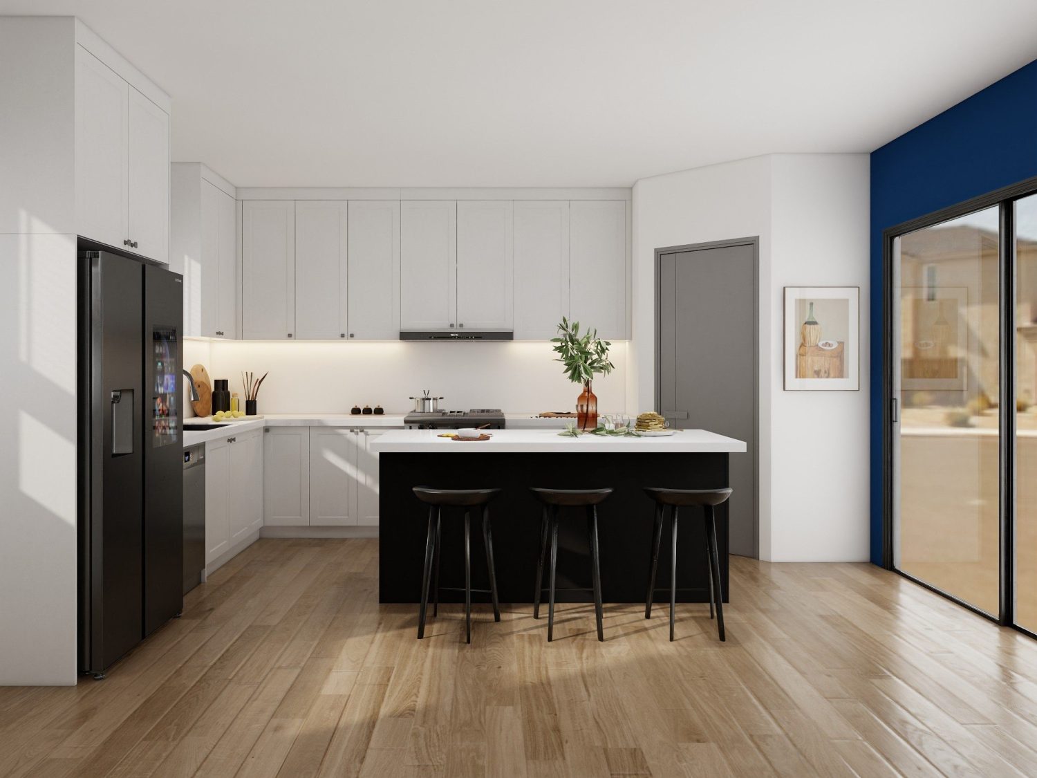 White Shaker kitchen cabinets with black two-tone island, framed panel doors and oak floorboards