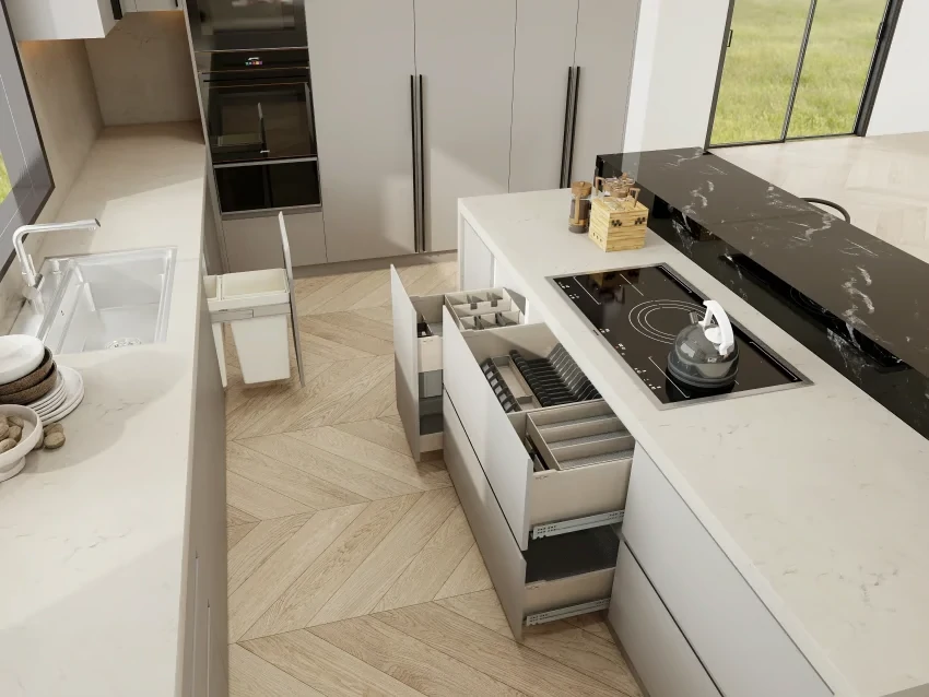 A kitchen with white shaker kitchen cabinets featuring built-in pull-out trash and recycling bins for a tidy and functional space
