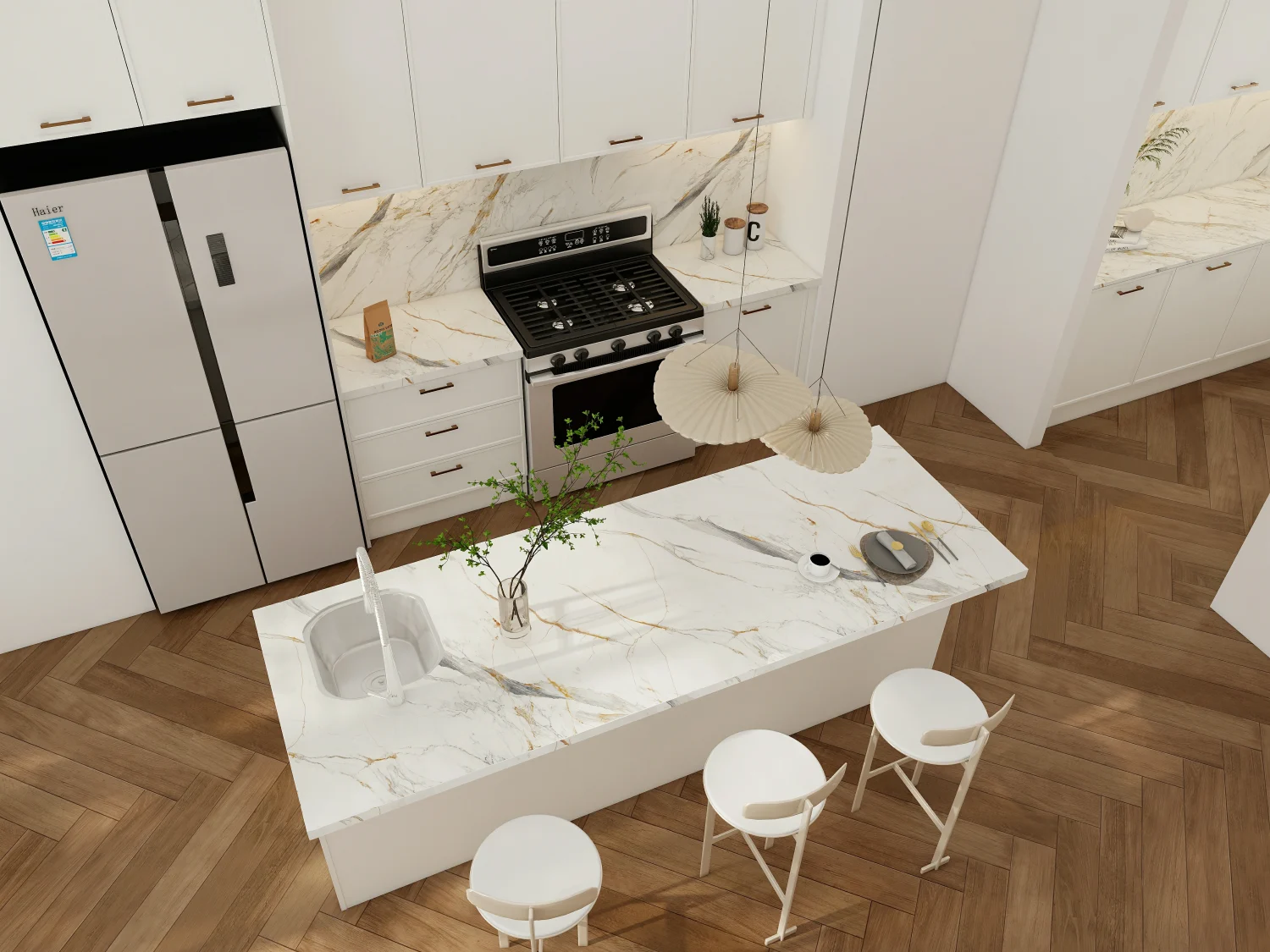 A kitchen with white shaker kitchen cabinets and classic marble countertops, featuring subtle veining and elegant finishes