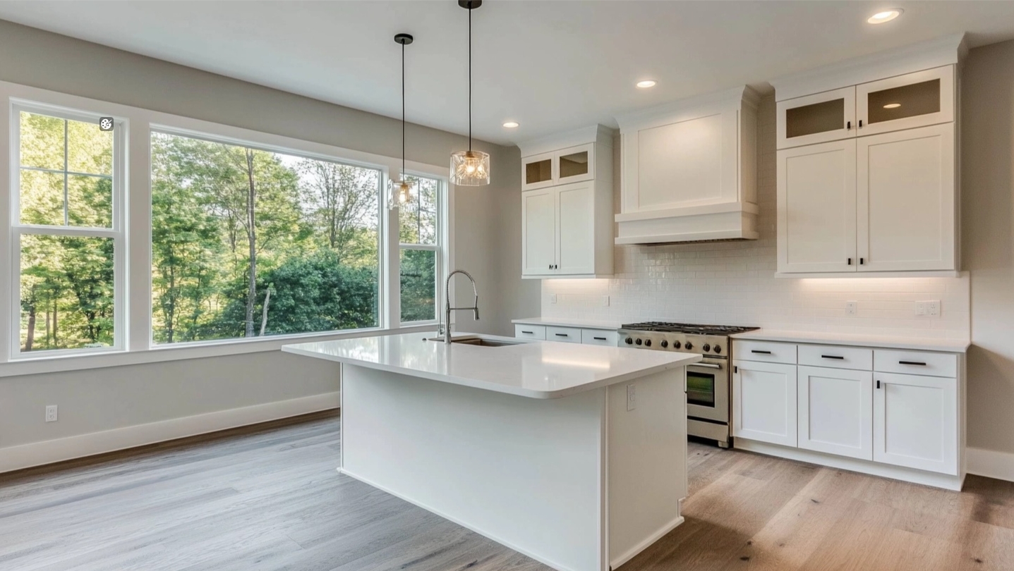 Bright kitchen with Borcci kitchen cabinets in white and a central island