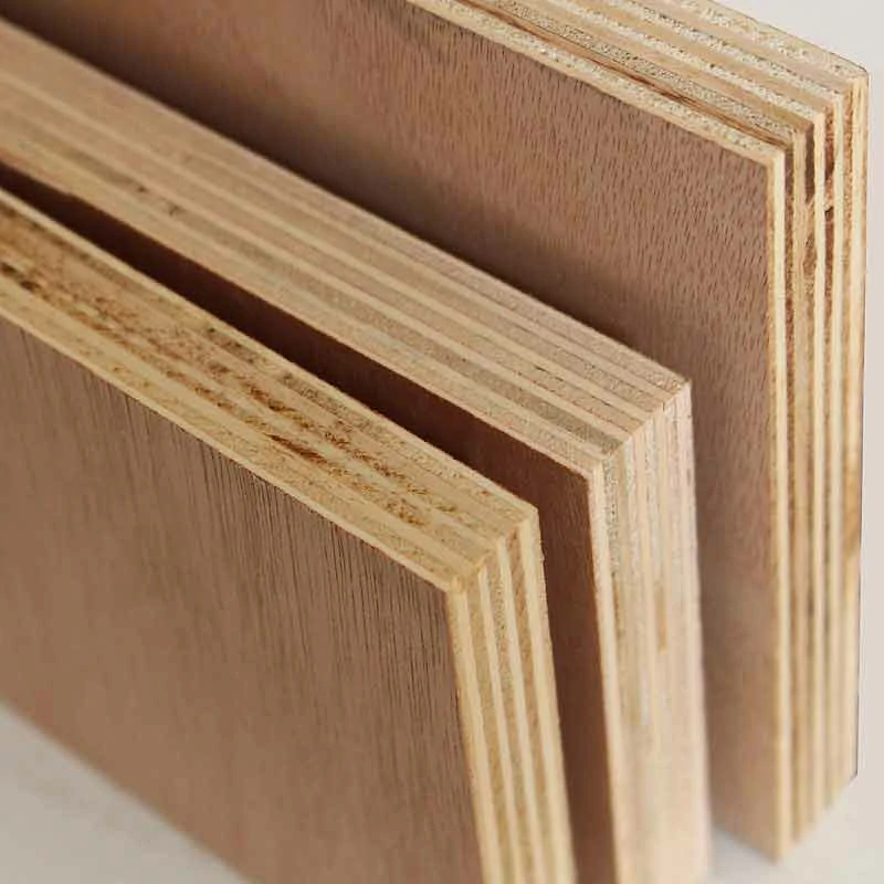 Close-up of plywood sheets with veneer layers, ideal for custom plywood kitchen cabinets.