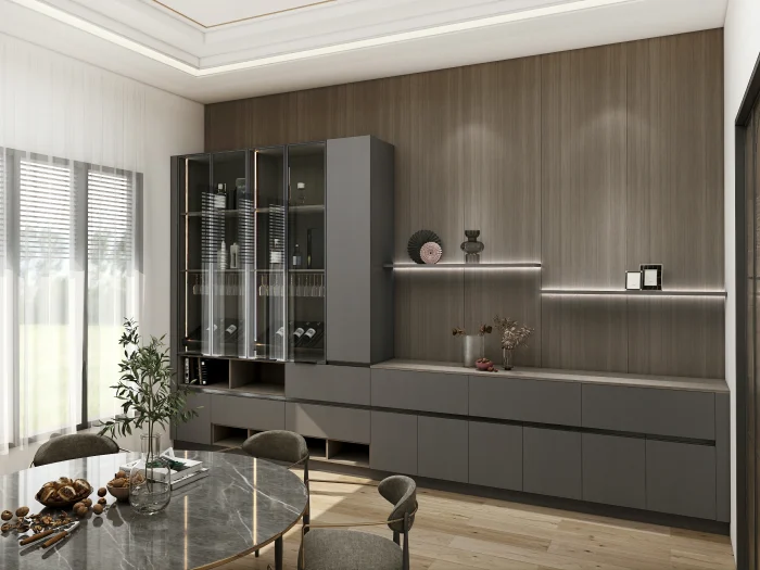 A modern dining room storage cabinet with glass-front sections and built-in shelving for organized display.