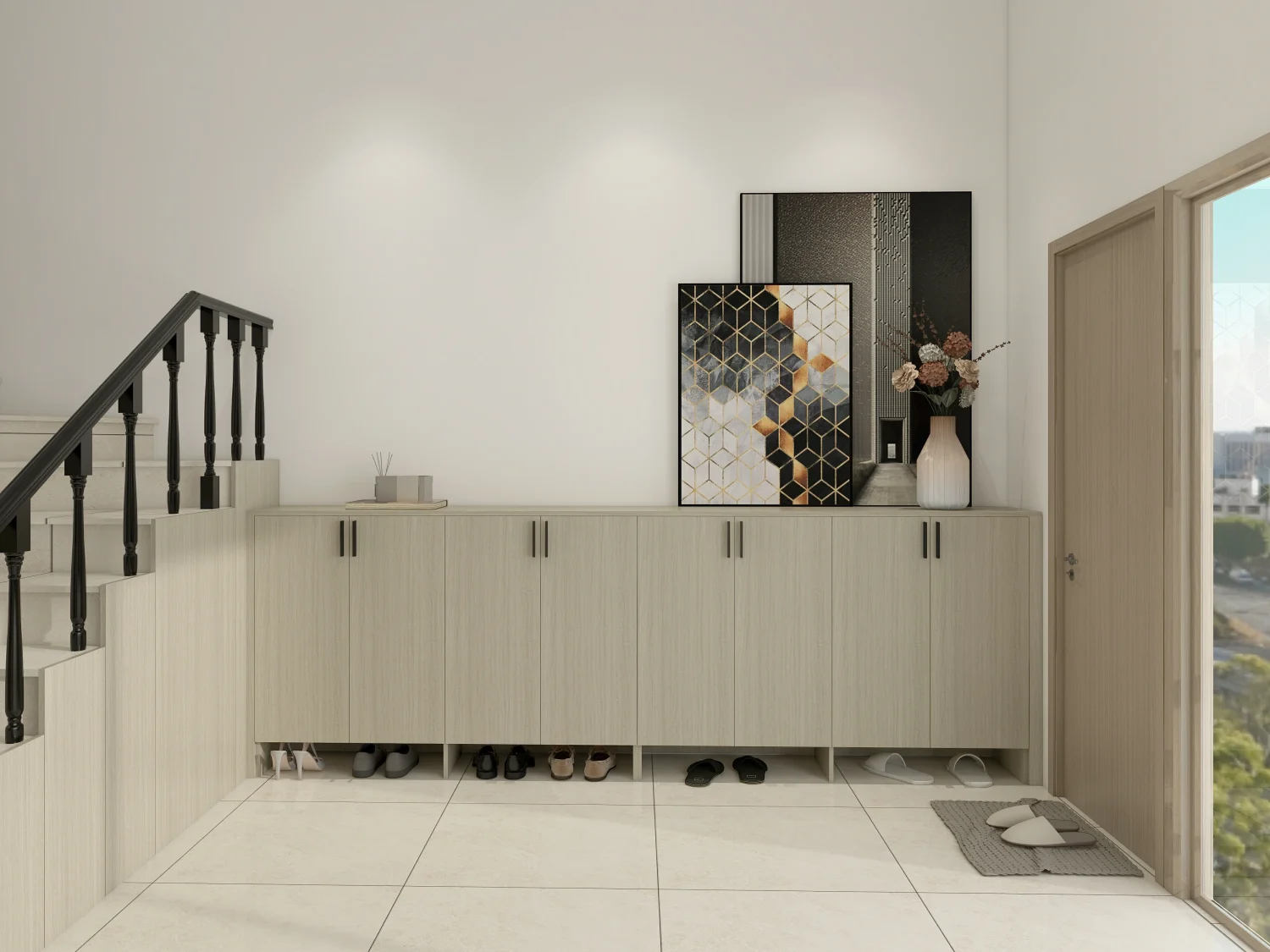 Buying a shoe cabinet entryway: What to Consider? 1 Contemporary shoe cabinet entryway under staircase with closed storage, artwork, and accents on tiled floor.