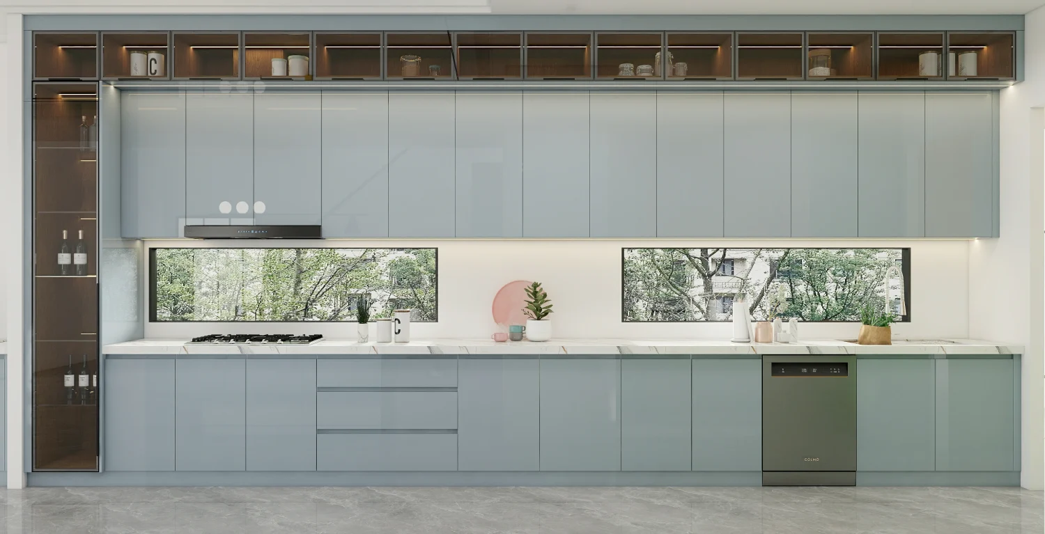 Handleless modern kitchen cabinet design in UAE with seamless blue-grey cabinets and marble countertop 