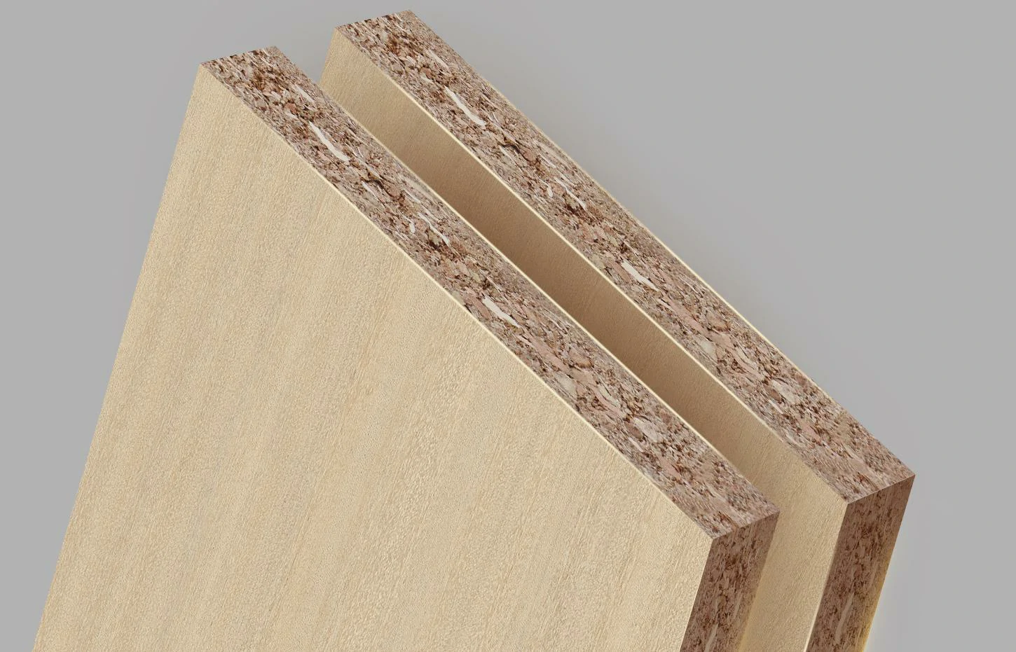 Close-up of particle board showing smooth surface and core material, highlighting moisture-resistant features for cabinetry