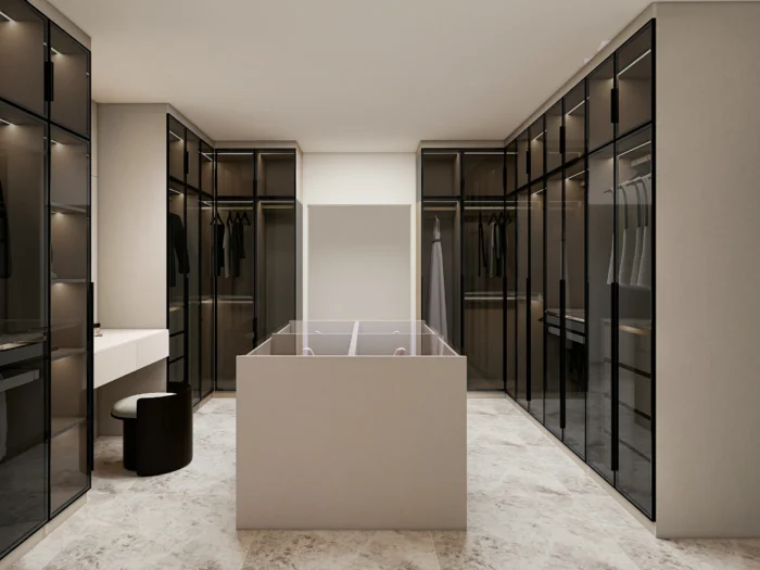 A luxurious walk-in closet designed for modern wardrobe needs.