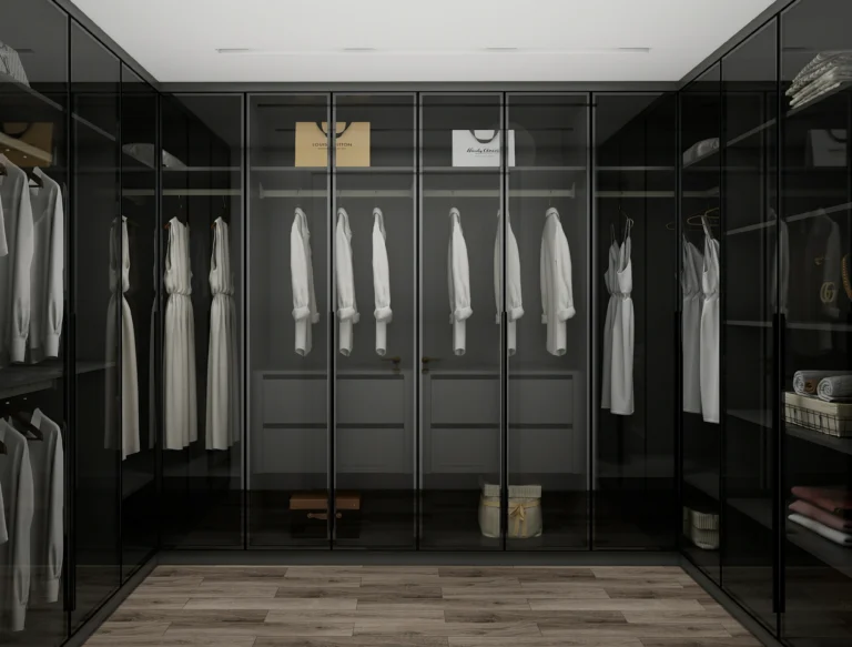 A black wardrobe placed in a master bedroom, offering a sophisticated and bold storage solution.