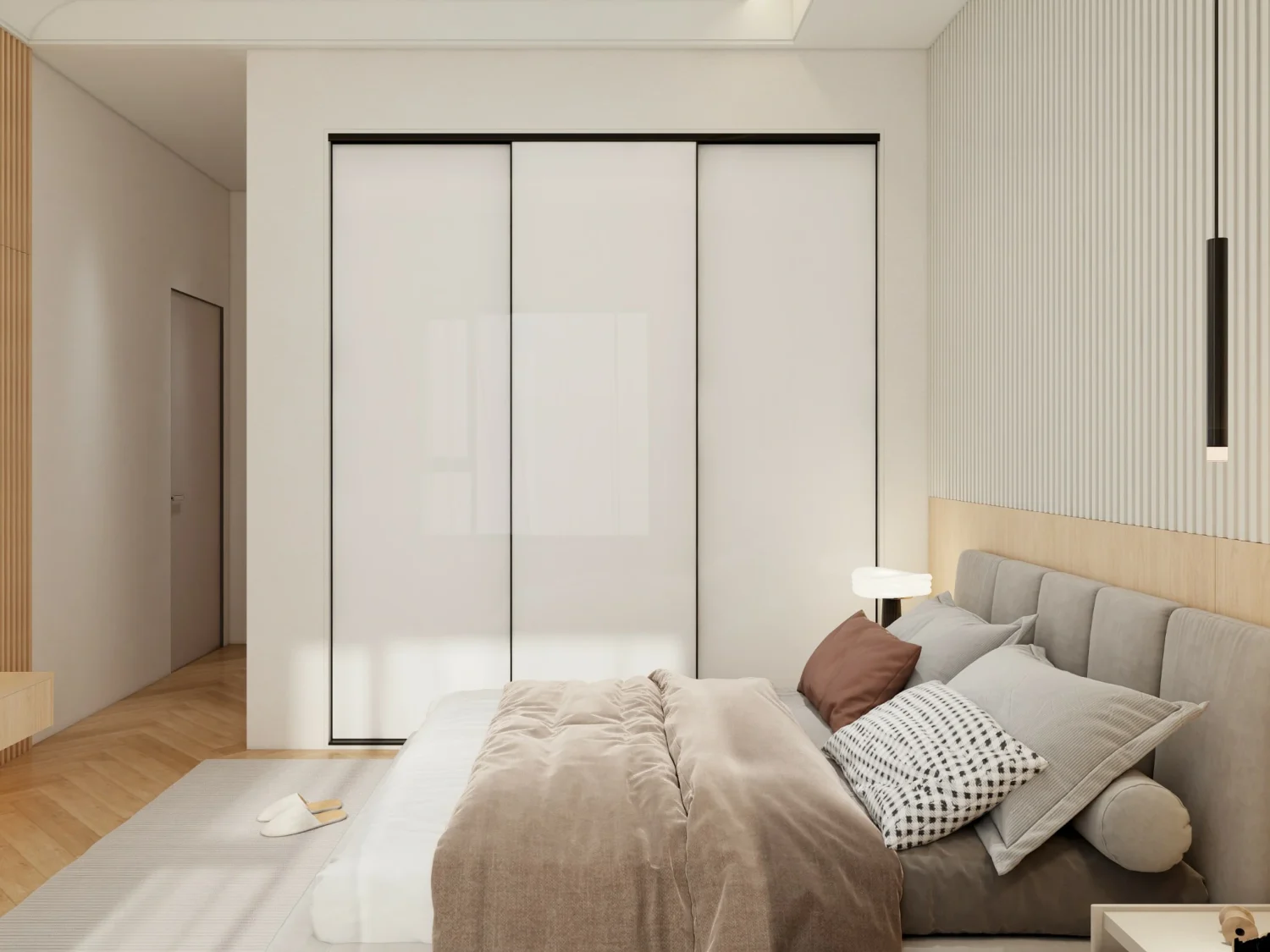 Modern sliding door wardrobe in a neutral-toned room, reflecting contemporary design principles.