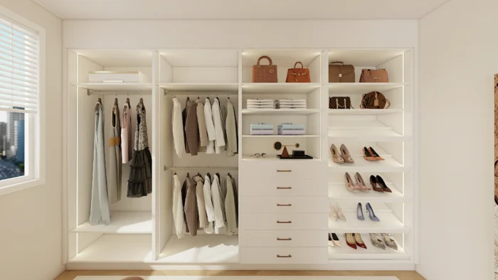White wardrobe with modular shelves and compartments for customizable storage solutions.