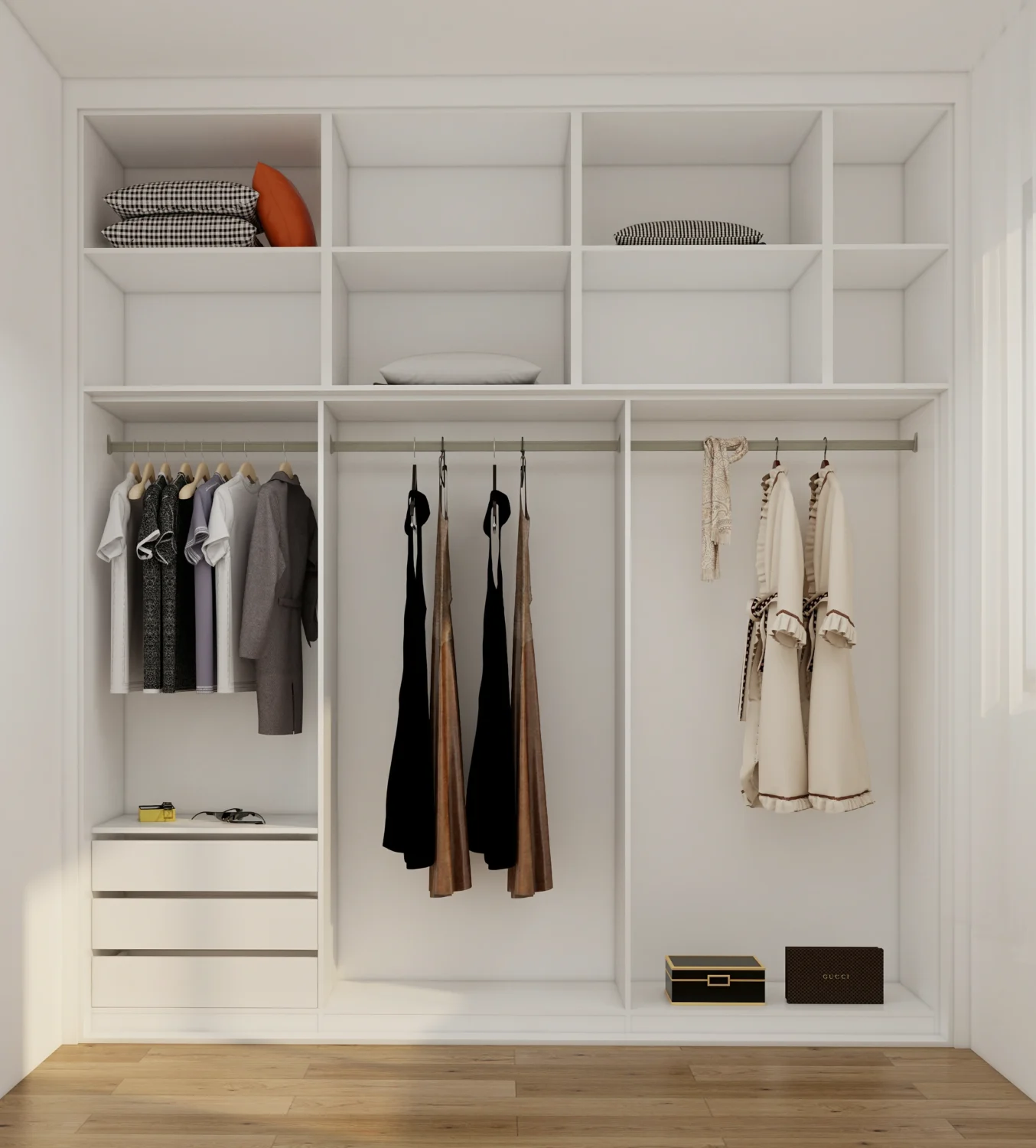 A tall white wardrobe utilizing vertical space for efficient storage of clothes and accessories.