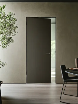 flush hinged modern interior door with concealed frame in minimalist living room setting