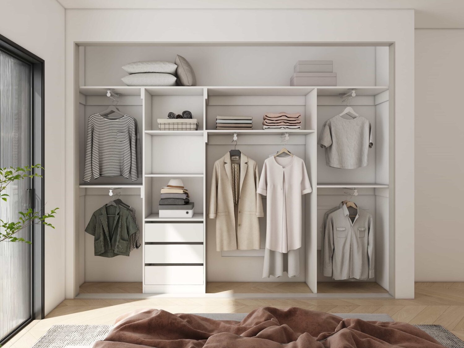 Modern built-in fitted wardrobe with white finish, drawers, shelves, and hanging space for clothes and accessories.