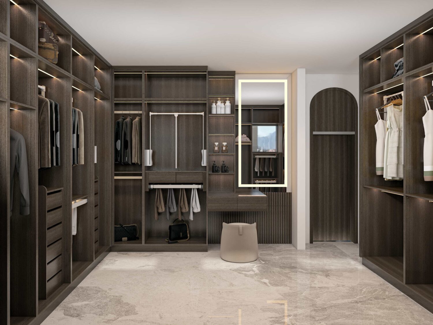 Modern custom wardrobe walk-in closet with dark wood finish, drawers, shelves, hanging space, and lighting.