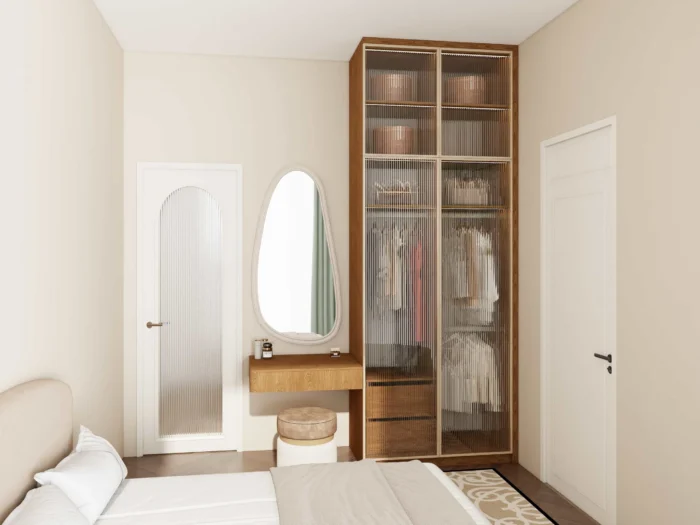 Double closet doors with frosted glass panels creating light and modern closet design.