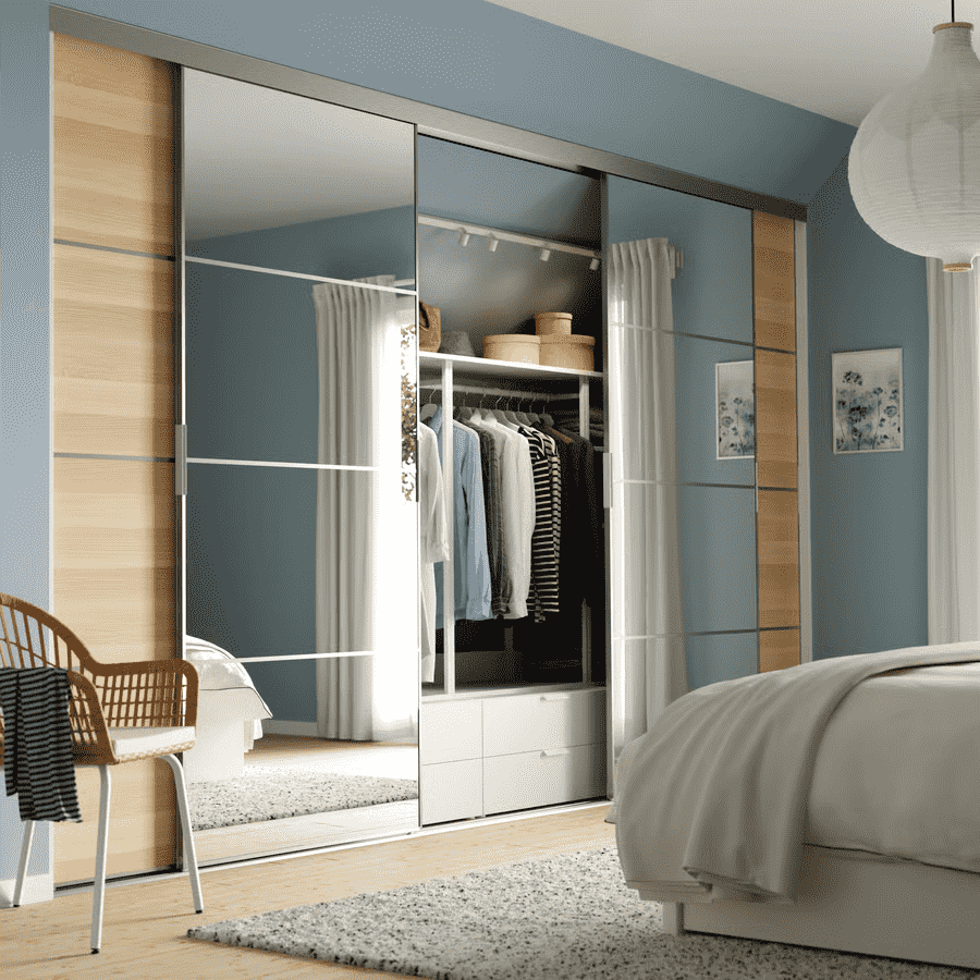 IKEA wardrobe with mirrored sliding doors, providing both functionality and a modern touch for any room.
