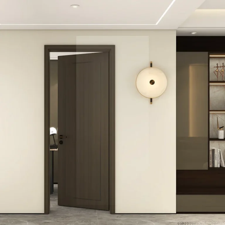 Wooden custom interior door in a modern home with warm neutral tones and soft lighting.