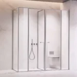 Sleek bathroom design featuring a glass shower enclosure and modern toilet