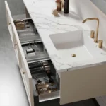 Stylish bathroom vanity with marble countertop and modern storage drawers showcasing sanitary ware