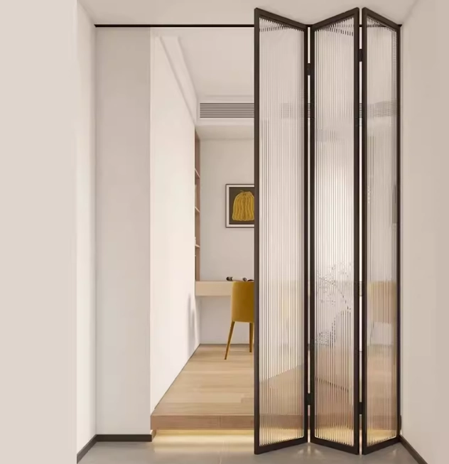 Folding sliding door separates living and study areas, combining flexibility and minimalist design.