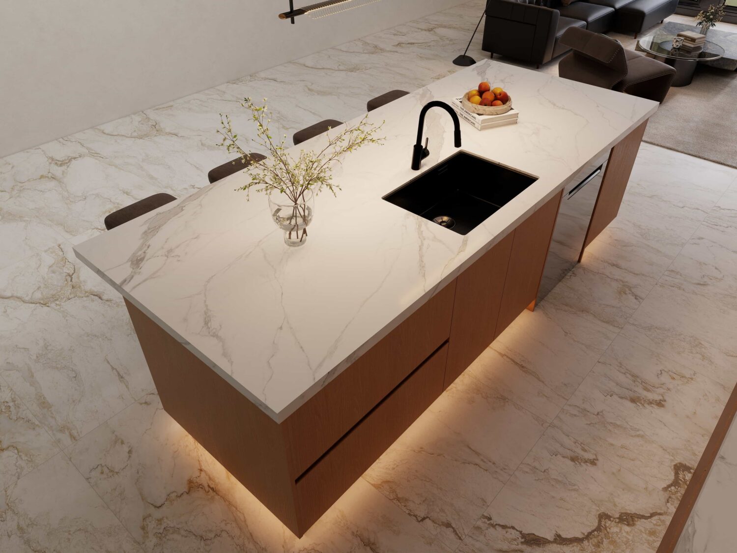 Modern kitchen island with marble top, black sink, and integrated lighting, offering a sleek design.
