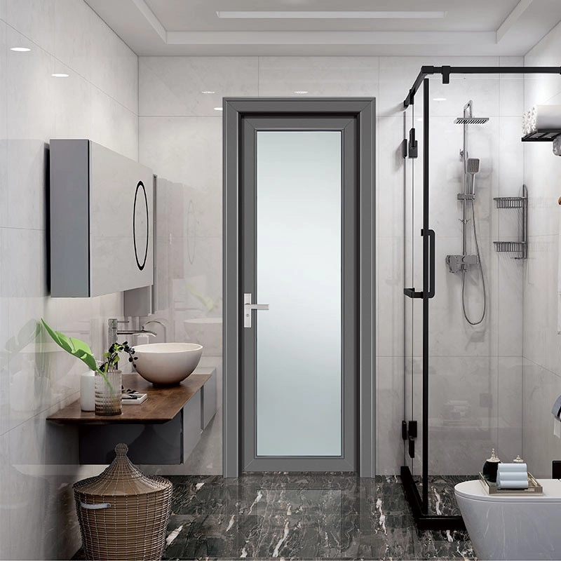 A frosted glass bathroom door providing soft light and privacy in a bright modern bathroom.
