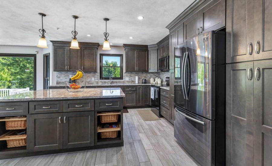 Natural Wood Cabinets with gray floor
