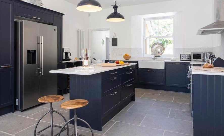 Navy Blue Cabinets with gray floor